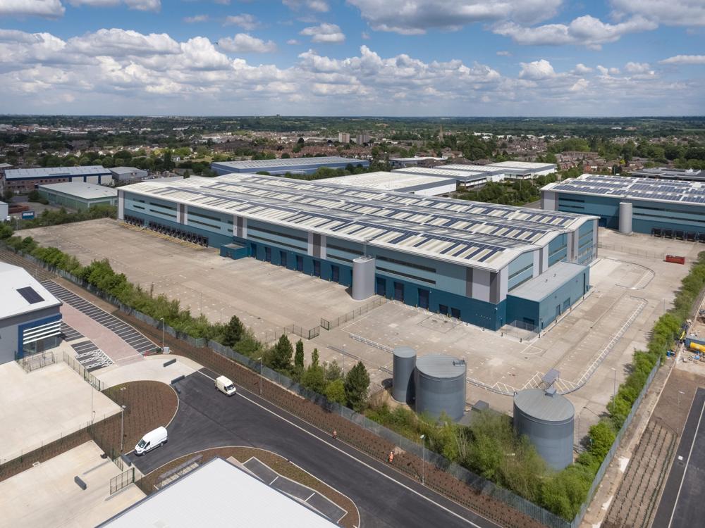 A modern commercial building with rooftop solar
